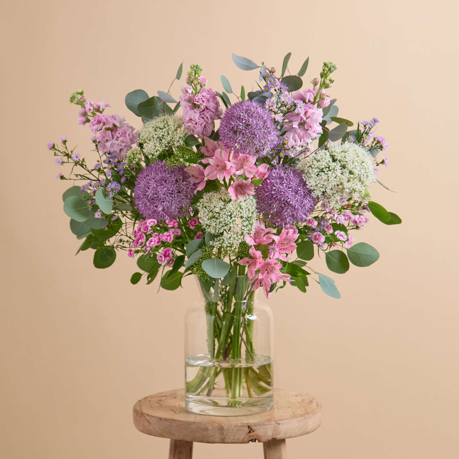 Flower bouquet with allium, stocks & trachelium | Send flowers online | Cloudwoven | size: classic